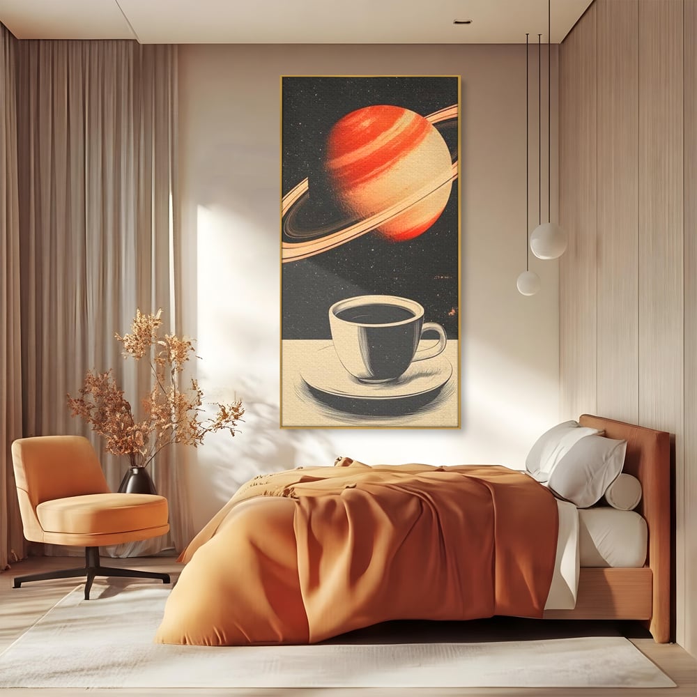 Tablou canvas cu ilustratie cu ceasca de cafea si planeta saturn, in rama de aluminiu auriu, pe perete intr-un dormitor